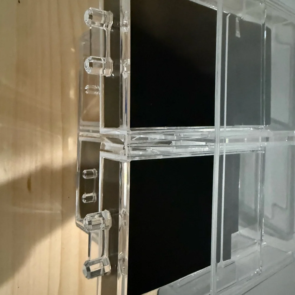 Sleek Acrylic Makeup Organizer with Black Detailing